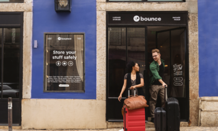 Couple walking out of Bounce location with bags
