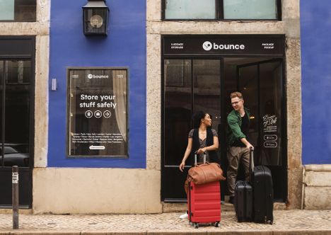 Couple walking out of Bounce location with bags